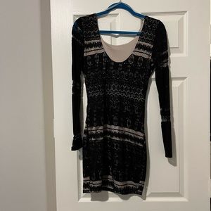 Black lace long sleeve dress by A’gaci